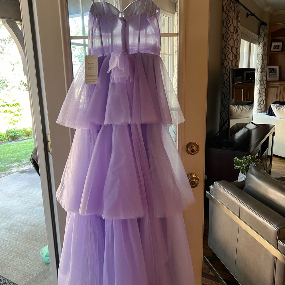 Gorgeous new with tags Stacee’s dress.  Size 12.